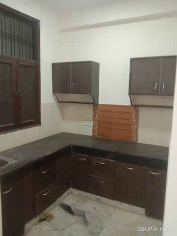 Kitchen in 3 BHK Builder Floor at Green Fields Colony – for Sale