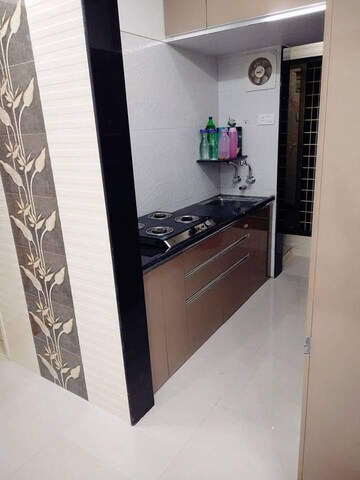 Kitchen in 2 BHK Apartment at Unique Aurum, Mira Road – for Sale
