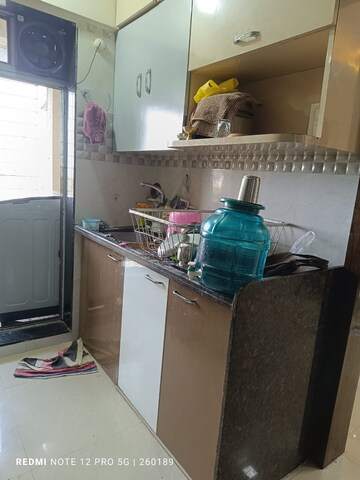 Kitchen in 3 BHK Apartment at Vinay Unique Gardens, Virar West – for Sale