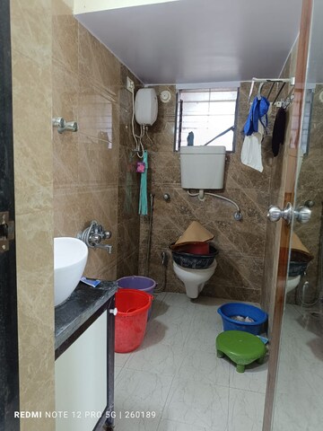 Bathroom in 3 BHK Apartment at Vinay Unique Gardens, Virar West – for Sale