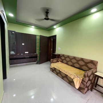 Living Room in 1 BHK Apartment at Chandak Sparkling Wings, Diamond Industrila Estate – for Sale