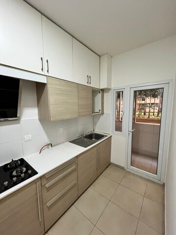 Kitchen in 2.5 BHK Apartment at Bhartiya Nikoo Homes, Thanisandra Main Road – for Sale