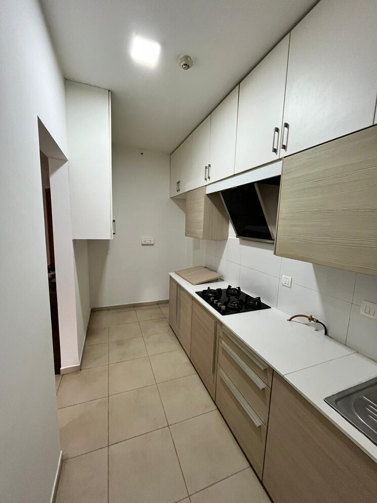 Kitchen, bhartiya-nikoo-homes 2.5 Bedroom 1300 Sq.Ft. Apartment In Thanisandra Main Road Bangalore 7257030