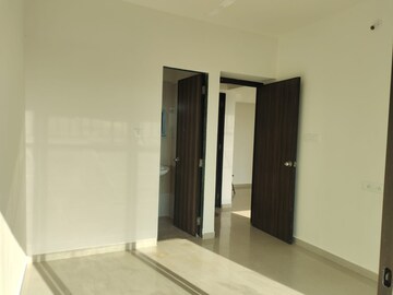 Master Bedroom in 1.5 BHK Apartment at Man Opus, Mira Road – for Sale