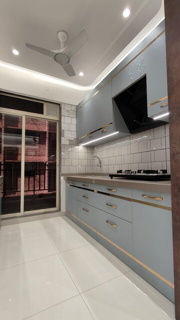 Kitchen in 2 BHK Apartment at Deeplaxmi Shreeji Meadows, Katrap – for Sale