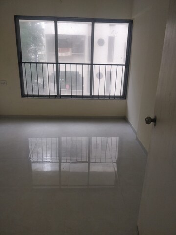Master Bedroom in 1 BHK Apartment at Mohid Swiz Heights, Andheri West – for Sale