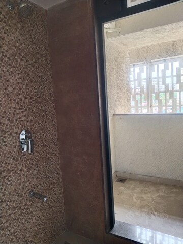 Bathroom in 1 BHK Apartment at Lodha Aqua, Mira Road – for Sale