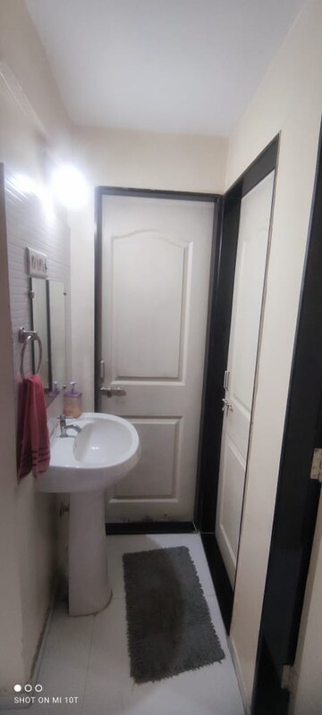 Bathroom in 2 BHK Apartment at Dhaval Windscape, Hadapsar – for Sale