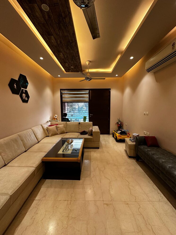 Living Room, tata-raheja-raisina-residency 4 Bedroom 3375 Sq.Ft. Apartment In Sector 59 Gurgaon 7260142