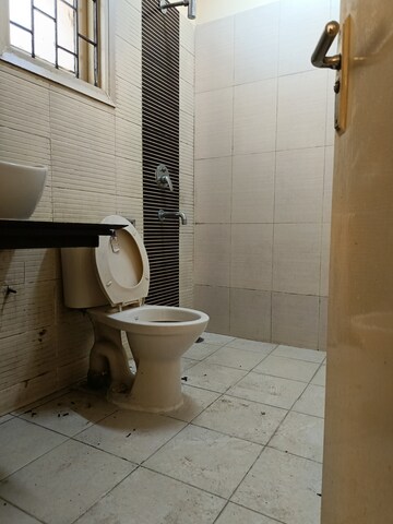 Bathroom in 3 BHK Builder Floor at Ansal Sushant Residency, Sushant Lok Iii – for Sale