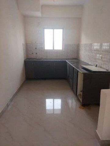 Kitchen in 3 BHK Apartment at Aims Golf City, Sector 75 – for Sale