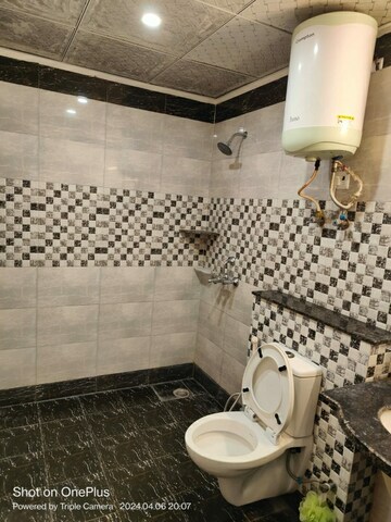 Bathroom in 4 BHK Apartment at Saya Gold Avenue, Vaibhav Khand – for Sale