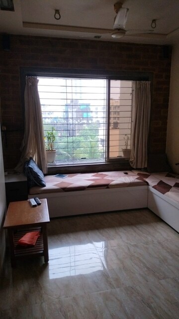Living Room in 1 BHK Apartment at Raj Tarang, Dahisar East – for Sale