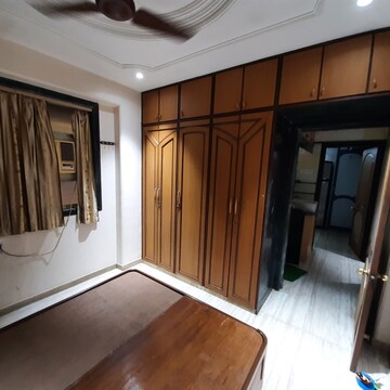 Bedroom in 1 BHK Apartment at Shreenath Nagar CHS, Ashok Van – for Sale