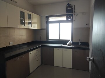Kitchen in 1 BHK Apartment at Puranik Rumah Bali, Ghodbunder Road – for Sale