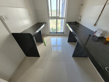 Kitchen in 2 BHK Apartment at Puraniks One Hometown, Ghodbunder Road – for Sale