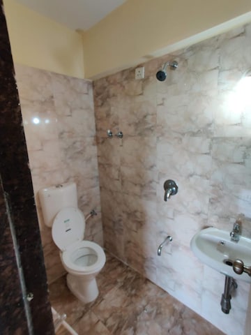 Bathroom in 2 BHK Apartment at Tilak Nagar – for Sale