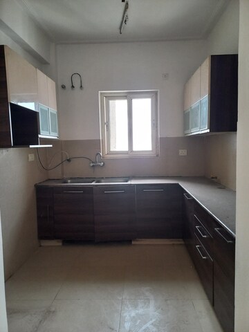 Kitchen in 3 BHK Apartment at Purvanchal Royal Park, Sector 137 – for Sale