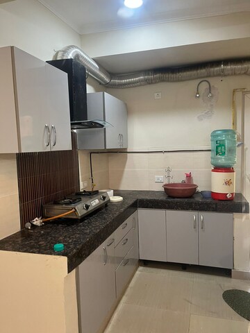 Kitchen in 2 BHK Apartment at Paramount Floraville, Sector 137 – for Sale