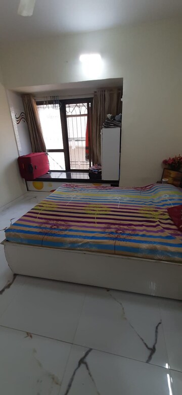 Bedroom in 2 BHK Apartment at Dheeraj Enclave, Borivali East – for Sale