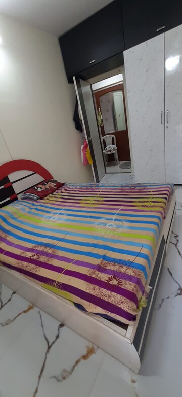 Bedroom in 2 BHK Apartment at Dheeraj Enclave, Borivali East – for Sale