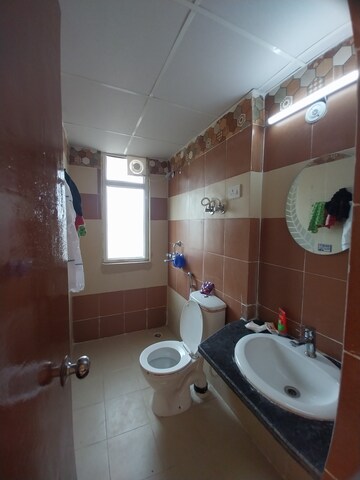 Bathroom in 2 BHK Apartment at Mahagun Mywoods, Sector 16c Greater Noida – for Sale