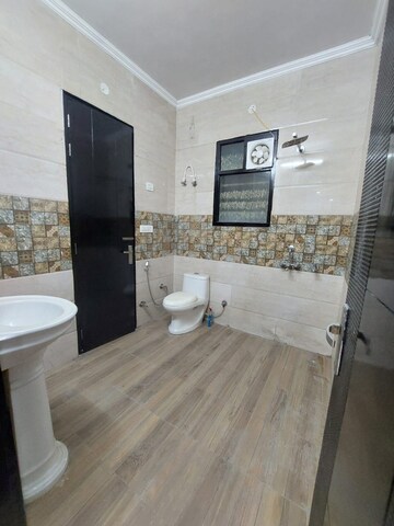 Bathroom in 4 BHK Builder Floor at Green Fields Colony – for Sale