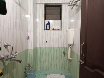 Bathroom in 2 BHK Apartment at Kopar Khairane – for Sale