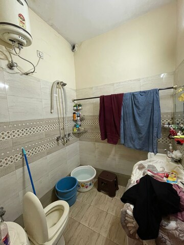 Bathroom in 1 BHK Apartment at Dhakoli Village – for Sale