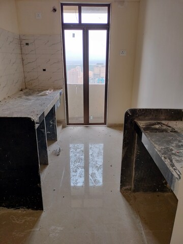Kitchen in 1 BHK Apartment at Ram Pushpanjali Residency, Owale – for Sale