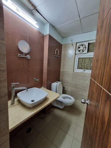 Bathroom in 3 BHK Apartment at Amrapali Princely Estate, Sector 76 – for Sale