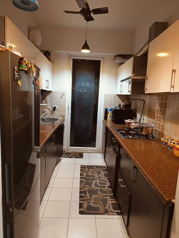Kitchen in 3 BHK Apartment at Amrapali Princely Estate, Sector 76 – for Sale