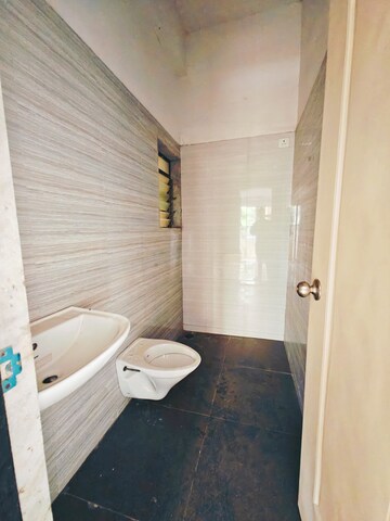 Bathroom in 1 BHK Apartment at Cosmos Jewels, Ghodbunder Road – for Sale