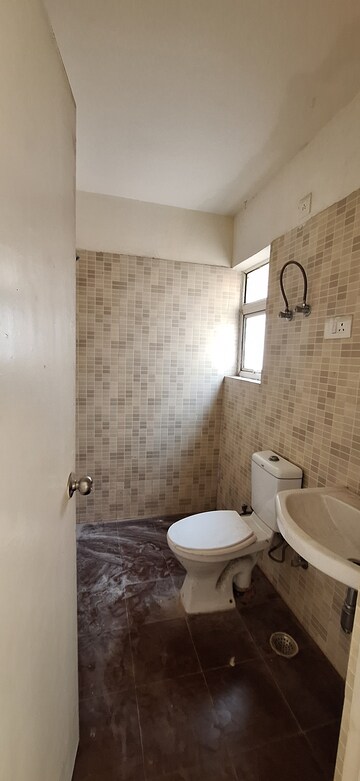 Bathroom in 3 BHK Apartment at Orris Carnation Residency, Sector 85 – for Sale