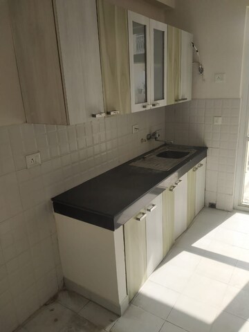 Kitchen in 2 BHK Apartment at Ramprastha City The Edge Towers, Sector 37d – for Sale
