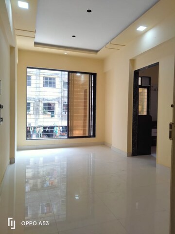 Living Room in 1 BHK Apartment at Man Rose Enclave, Virar East – for Sale