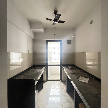 Kitchen in 1.5 BHK Apartment at Lodha Lakeshore Greens, Hedutane – for Sale