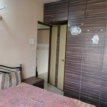 Master Bedroom in 1 BHK Apartment at Lourdes Citadel, Dahisar West – for Sale
