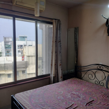 Master Bedroom in 1 BHK Apartment at Lourdes Citadel, Dahisar West – for Sale