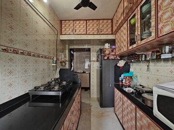 Kitchen in 3 BHK Apartment at Benzer Tower, Kandivali East – for Sale