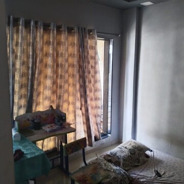 Living Room in 1 BHK Apartment at Reliable Heights, Nalasopara West – for Sale