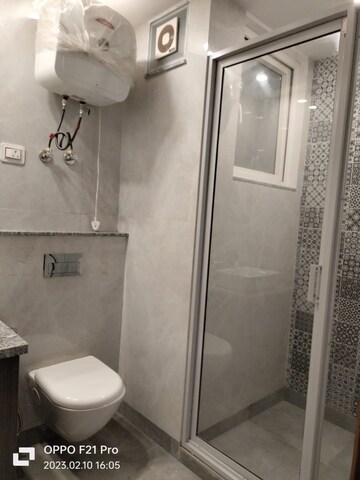 Bathroom in 4 BHK Apartment at Ambience Caitriona, Sector 24 – for Sale