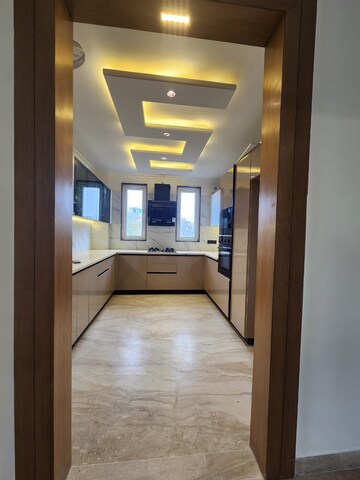 Kitchen in 4 BHK Apartment at Ambience Caitriona, Sector 24 – for Sale