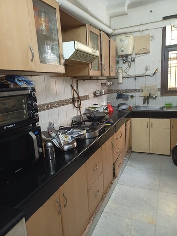 Kitchen in 4 BHK Apartment at Purvanchal Silver Estate, Sector 50 – for Sale