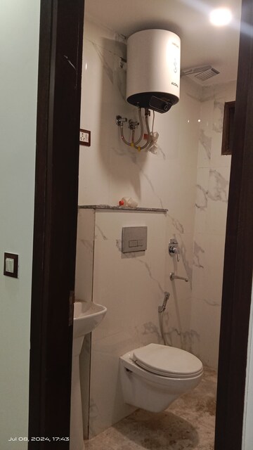 Bathroom in 3 BHK Builder Floor at Chattarpur – for Sale