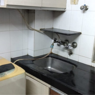 Kitchen in 1 BHK Apartment at Happy Home Estate, Sector 10 – for Sale