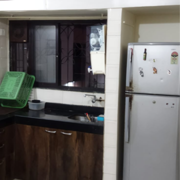 Kitchen in 2 BHK Apartment at Om Shantidham CHS, Gaurav Galaxy – for Sale