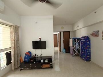 Living Room in 1 BHK Apartment at Lodha Amara, Kolshet Road – for Sale