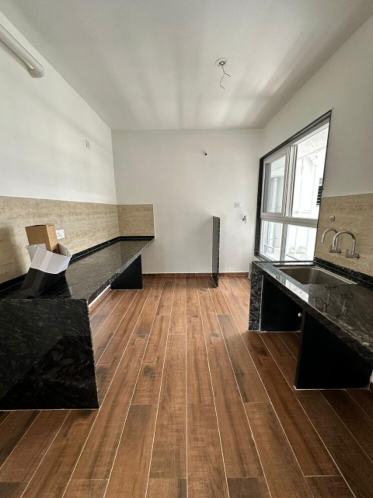 Kitchen, unique-k-town 3 Bedroom 1035 Sq.Ft. Apartment In Kiwale Pune 7274258