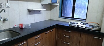 Kitchen in 1 BHK Apartment at Royal Palms, Goregaon East – for Sale
